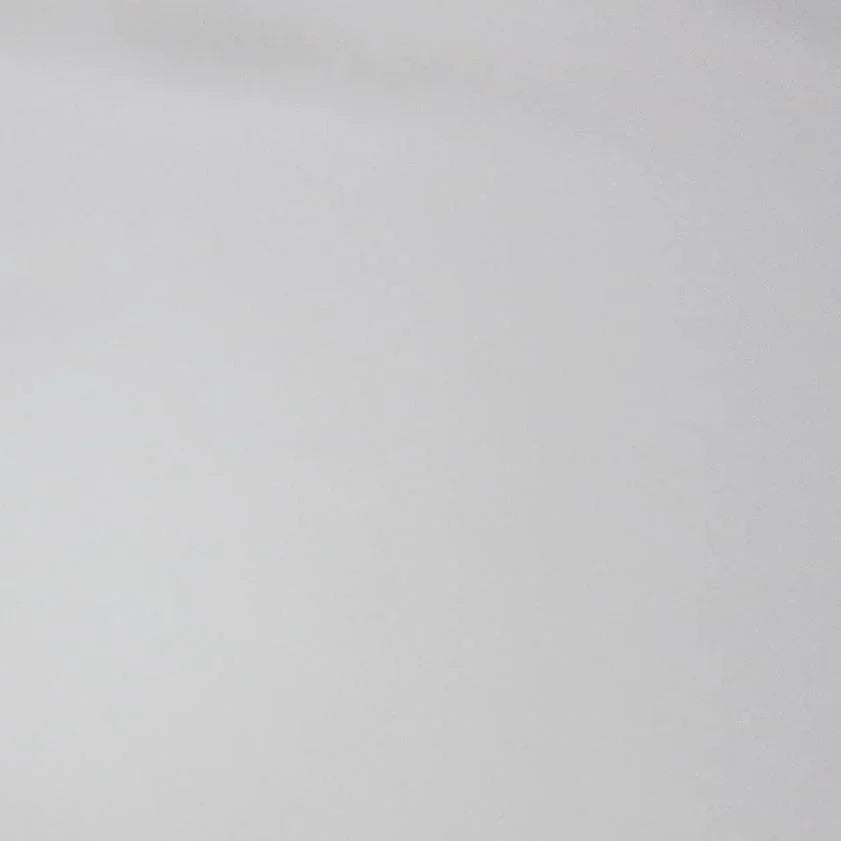 Close-up of a plain light grey natural fabric from Nature's Fabrics