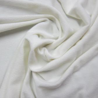 Close-up of draped white organic fabric from Nature's Fabrics.