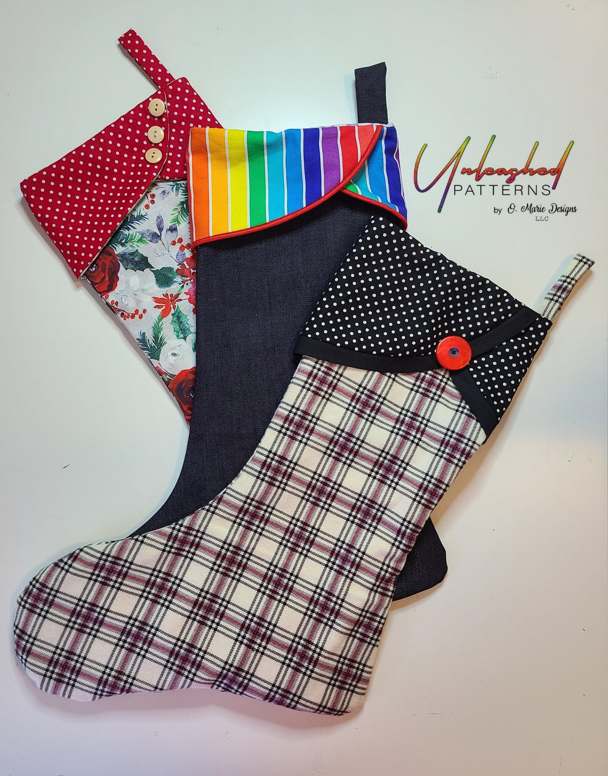 Handmade fabric Christmas stockings by Unleashed Patterns in rainbow, plaid, and polka dot prints.