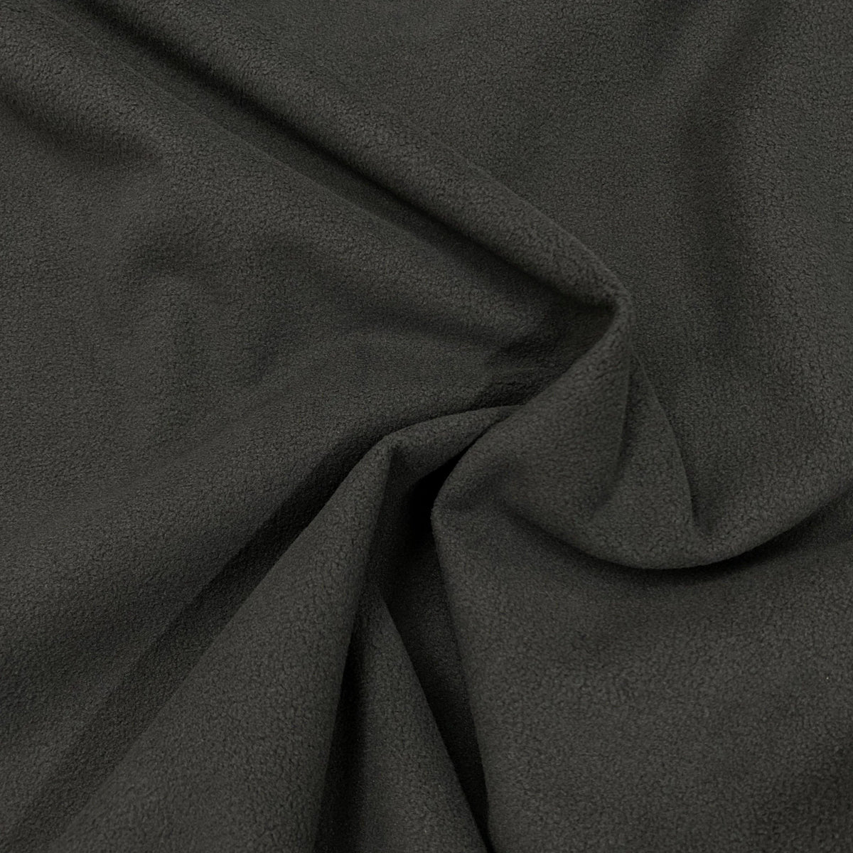 Close-up of draped charcoal grey natural fabric from Nature's Fabrics