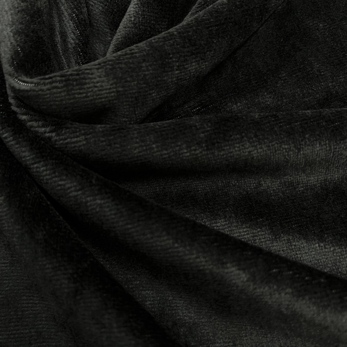 Close-up of draped black velvet fabric from Nature's Fabrics.