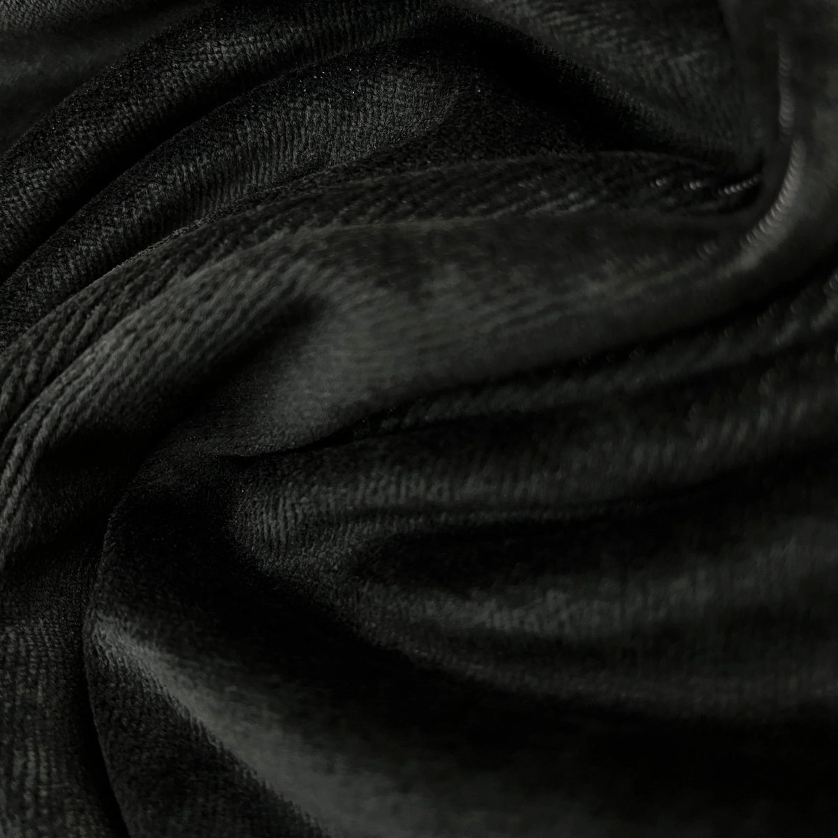 Close-up of draped black velvet fabric from Nature's Fabrics