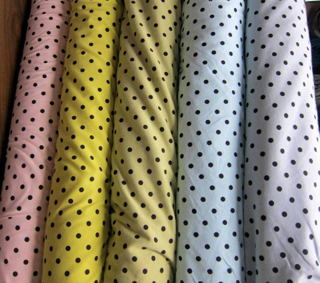 Black Dots On Yellow Cotton Jersey Fabric - Nature's Fabrics