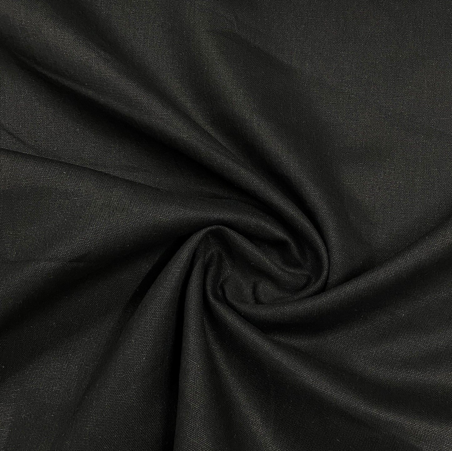 Close-up of swirled black premium natural fabric by Nature's Fabrics