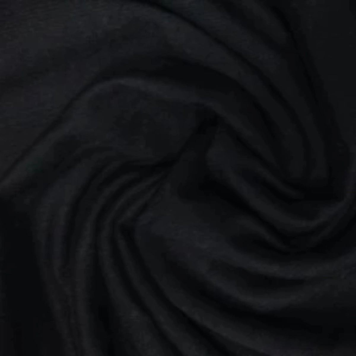 Close-up of draped black premium natural fabric from Nature's Fabrics
