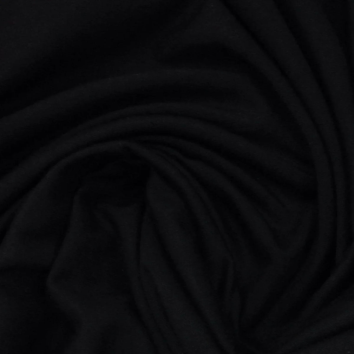 Close-up of draped black natural fabric from Nature's Fabrics