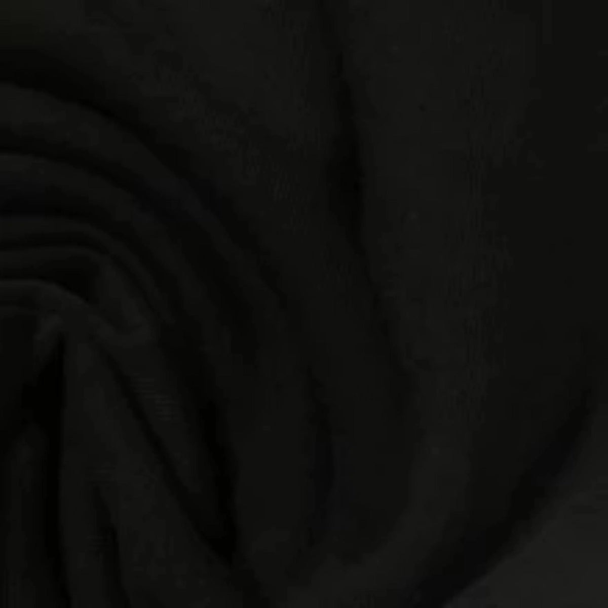 Close-up of draped black natural fabric from Nature's Fabrics