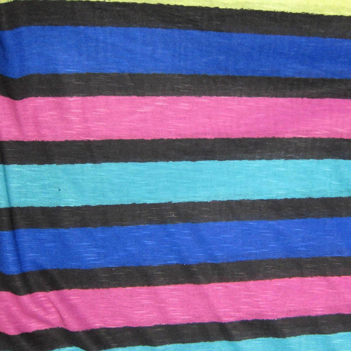 Nature's Fabrics multi-colored striped natural fabric with pink, blue, and teal bands.