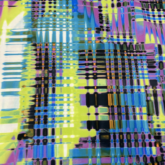 Abstract geometric pattern fabric in blue, yellow, and purple from Nature's Fabrics