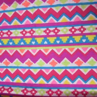 Bright Aztecs on White Cotton Jersey Fabric - Nature's Fabrics