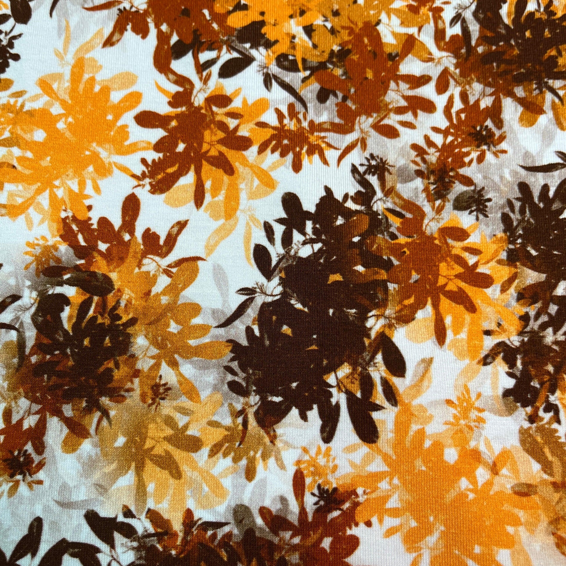 Brown and Orange Leaves on Bamboo/Spandex Jersey Fabric - Nature's Fabrics