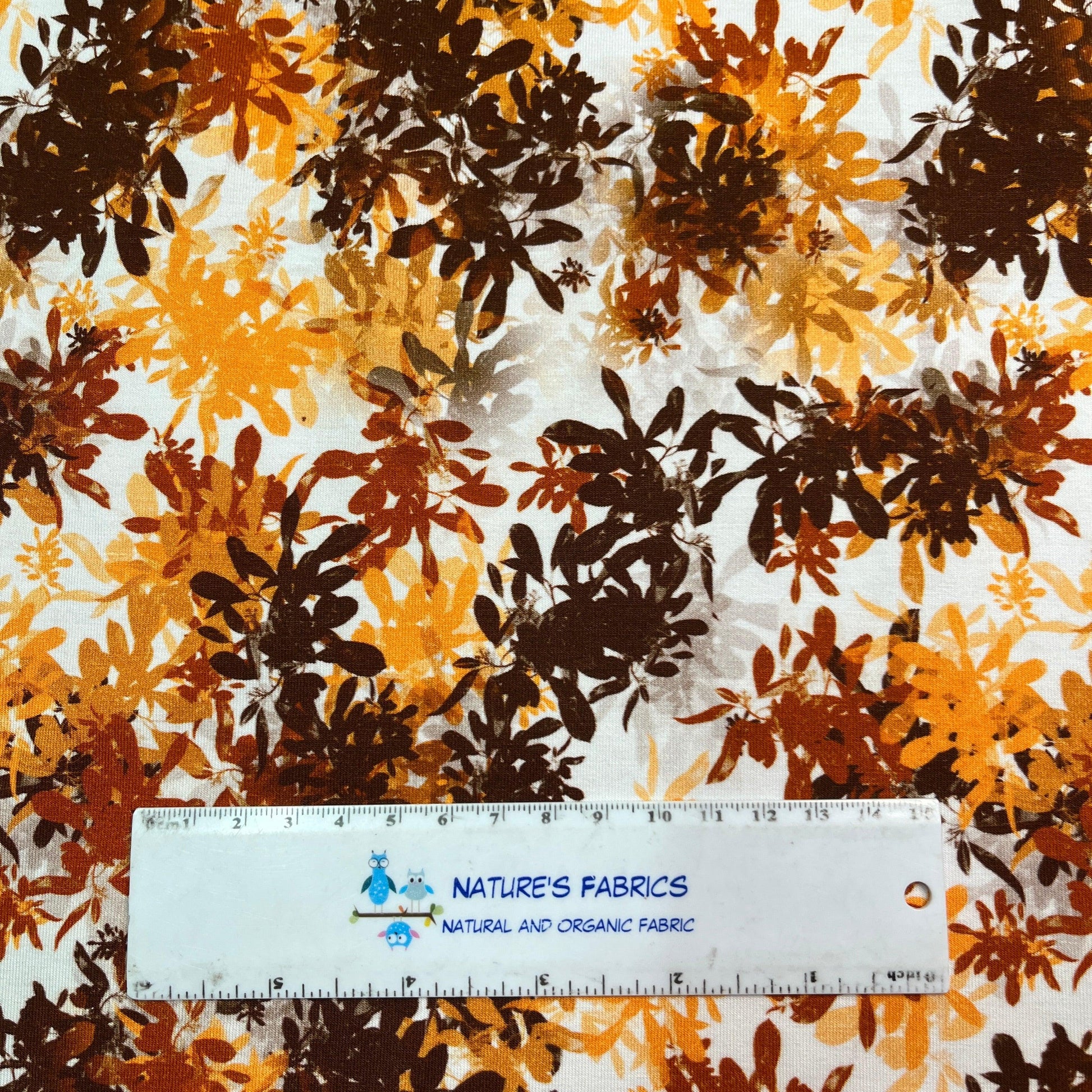 Brown and Orange Leaves on Bamboo/Spandex Jersey Fabric - Nature's Fabrics