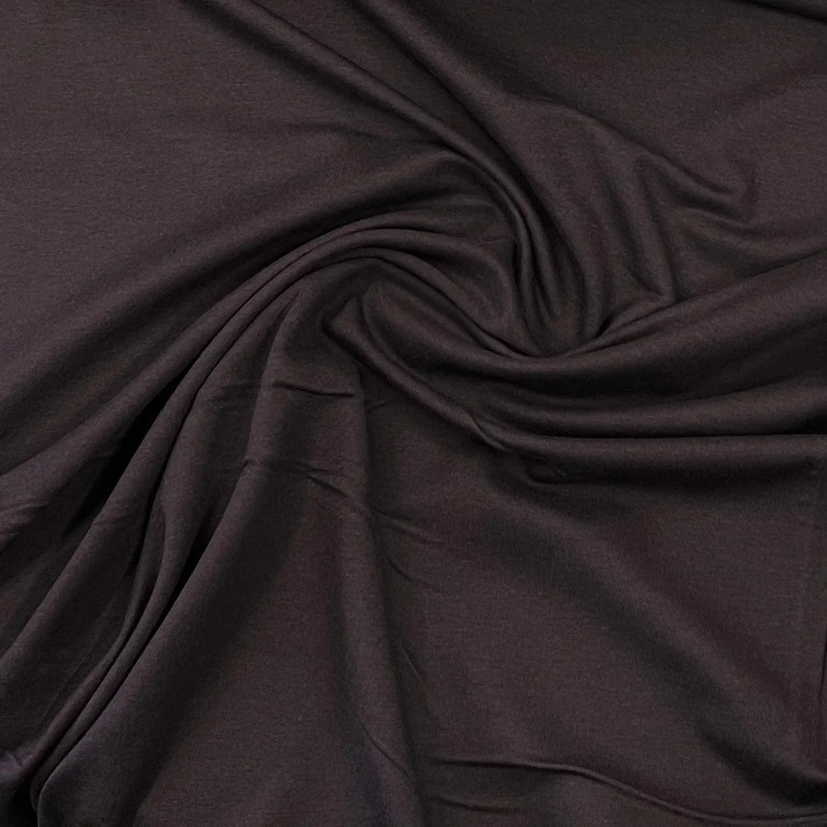 Swirl of premium dark brown natural fabric from Nature's Fabrics