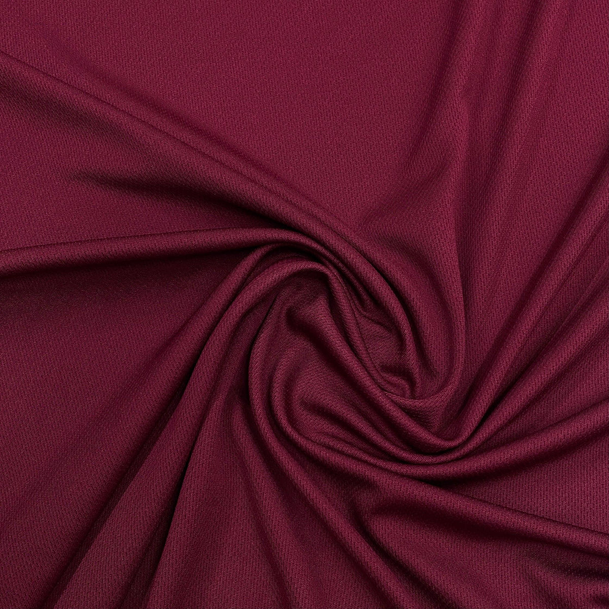 Swirled maroon premium fabric from Nature's Fabrics