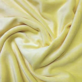 Close-up of soft, draped pale yellow fabric from Nature's Fabrics