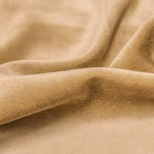 Close-up of draped gold velvet fabric from Nature's Fabrics