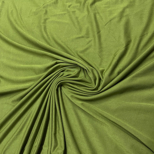 Olive green natural fabric draped in a swirl from Nature's Fabrics