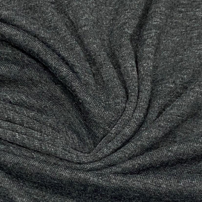 Close-up of draped charcoal grey natural fabric from Nature's Fabrics