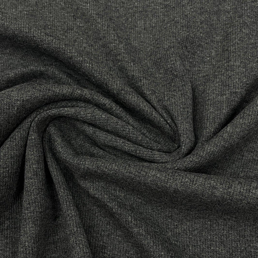 Close-up of draped charcoal grey natural fabric from Nature's Fabrics.