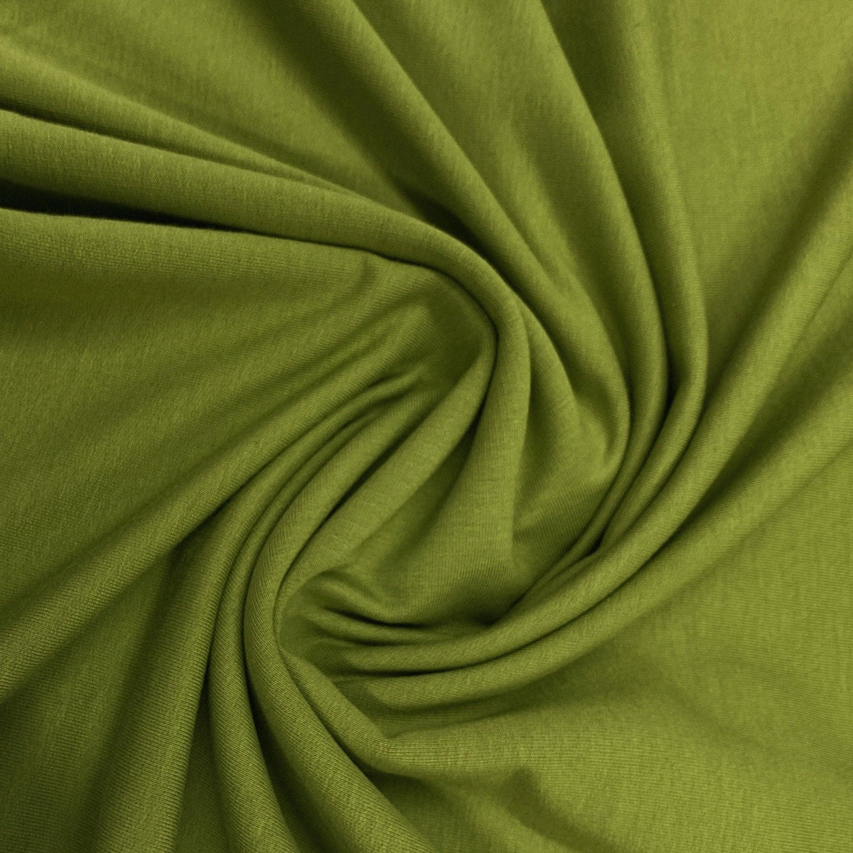 Swirl of olive green natural fabric from Nature's Fabrics