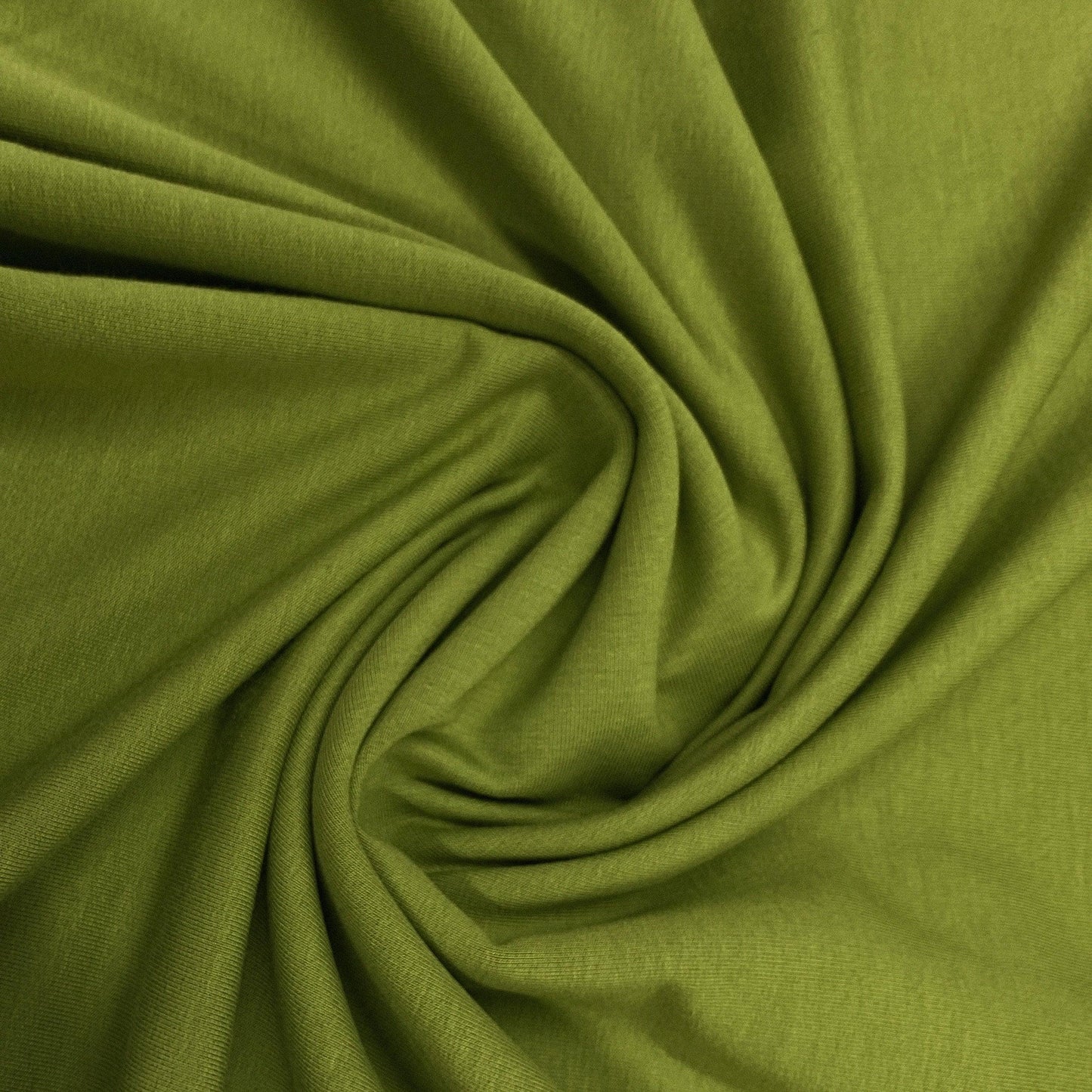 Draped olive green natural fabric from Nature's Fabrics.