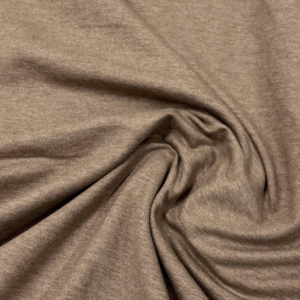 Close-up of draped brown natural fabric from Nature's Fabrics