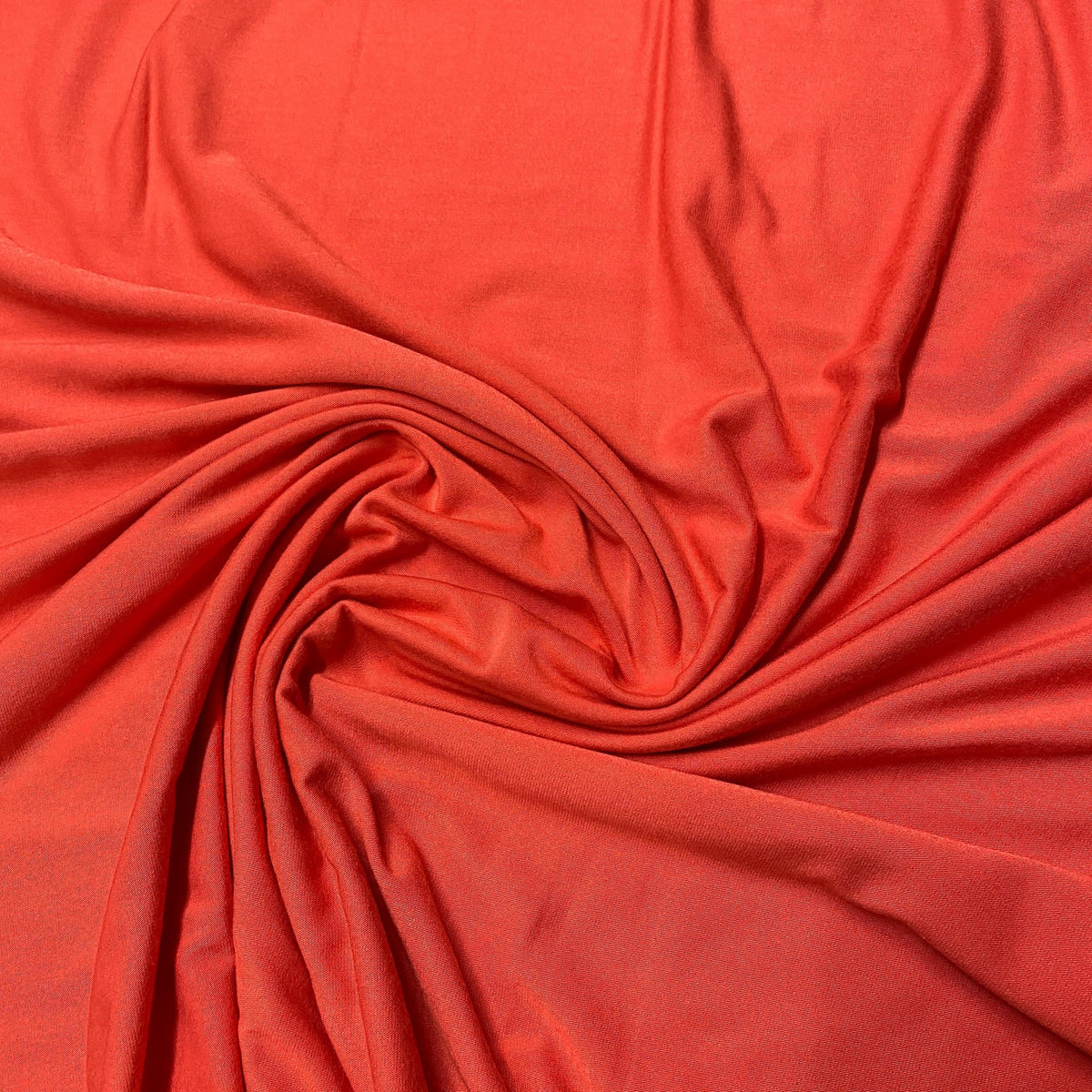 Swirled red premium fabric by Nature's Fabrics