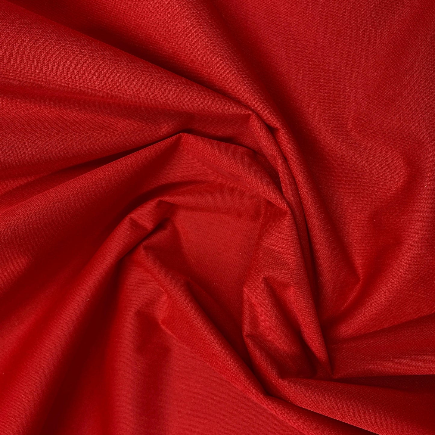 Red organic cotton fabric with soft folds from Nature's Fabrics