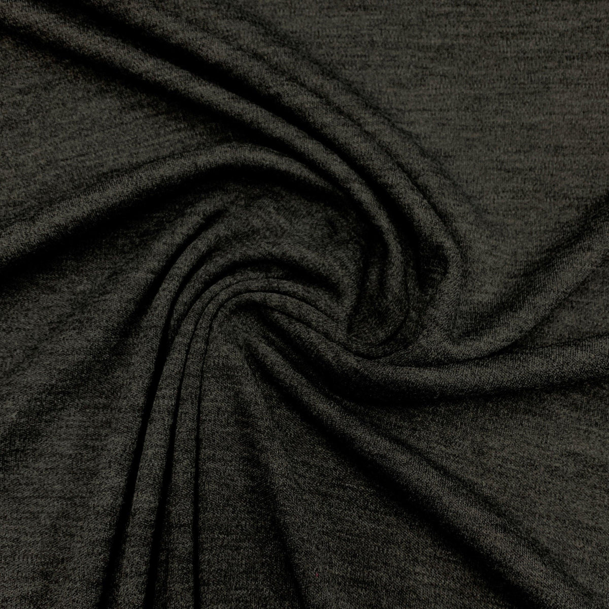 Close-up of draped charcoal grey organic fabric from Nature's Fabrics.