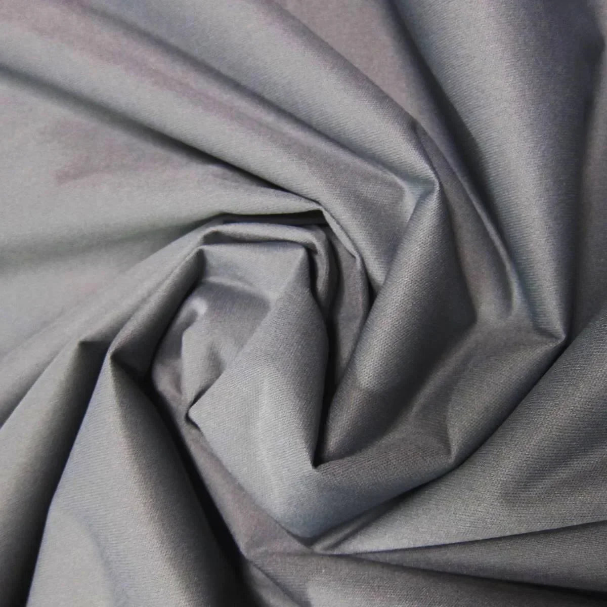Close-up of draped grey natural fabric by Nature's Fabrics.