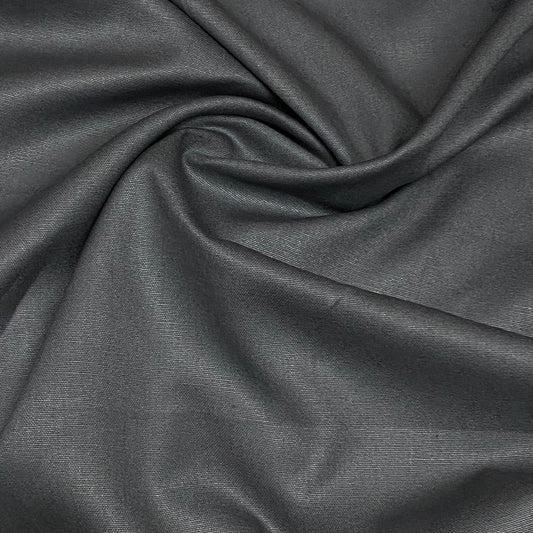 Close-up of draped charcoal grey premium natural fabric from Nature's Fabrics