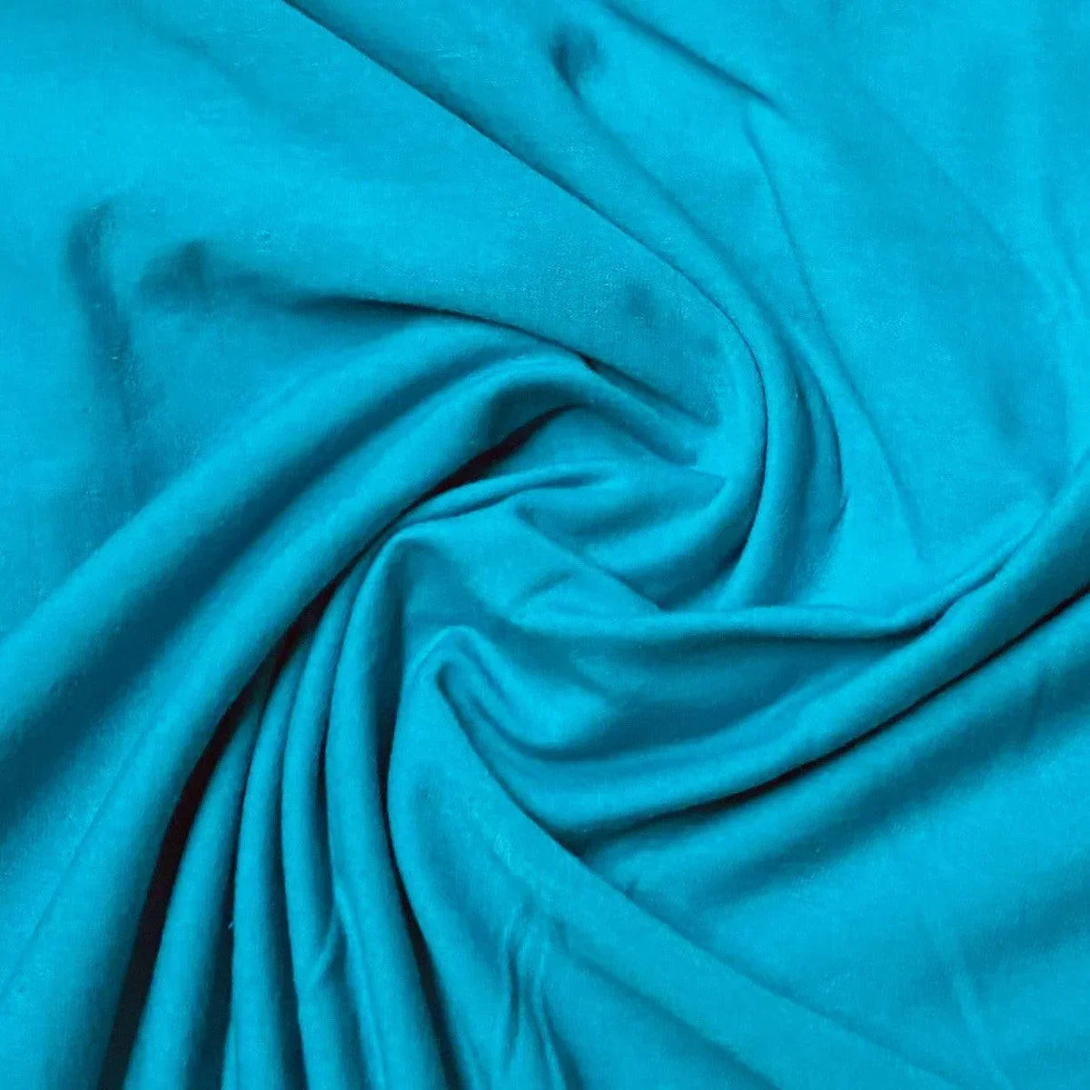 Swirl of turquoise blue premium fabric from Nature's Fabrics