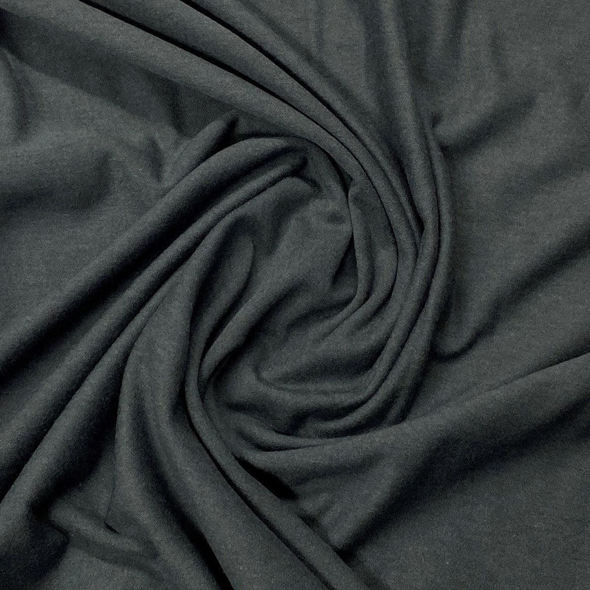 Dark grey premium natural fabric draped in swirls from Nature's Fabrics