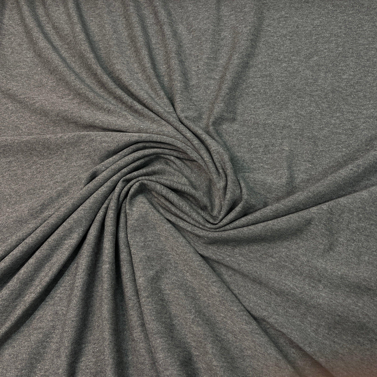 Close-up of draped charcoal grey natural fabric from Nature's Fabrics