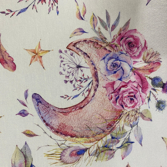 Nature's Fabrics cloth featuring a watercolor crescent moon with floral accents and a star.