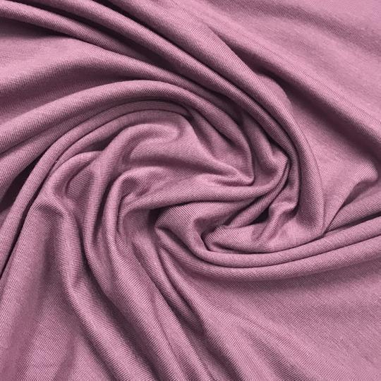 Swirl of mauve-colored natural fabric from Nature's Fabrics