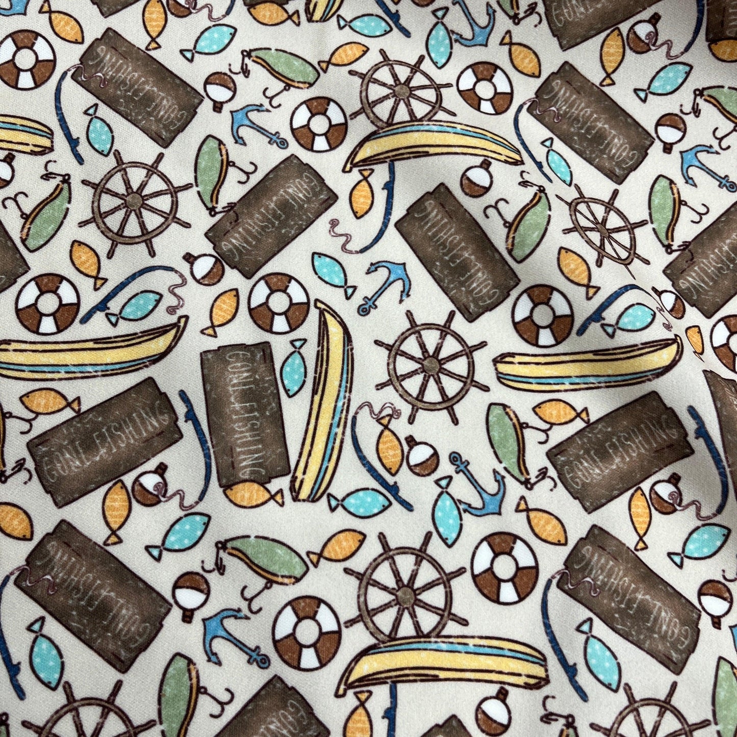Gone Fishing on Tan 1 mil PUL Fabric - Made in the USA - Nature's Fabrics