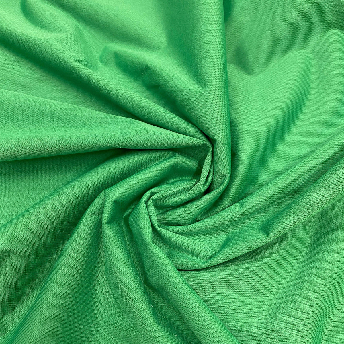 Swirl of bright green premium natural fabric from Nature's Fabrics