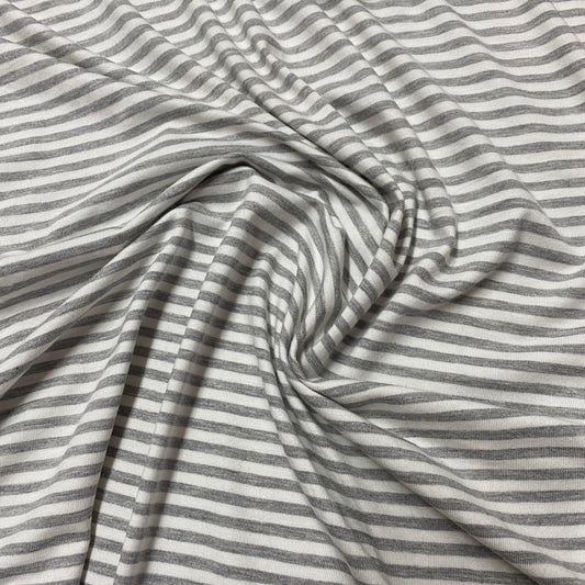 Nature's Fabrics grey and white striped natural cotton fabric draped in folds