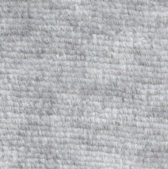Close-up of light gray textured wool fabric from Nature's Fabrics