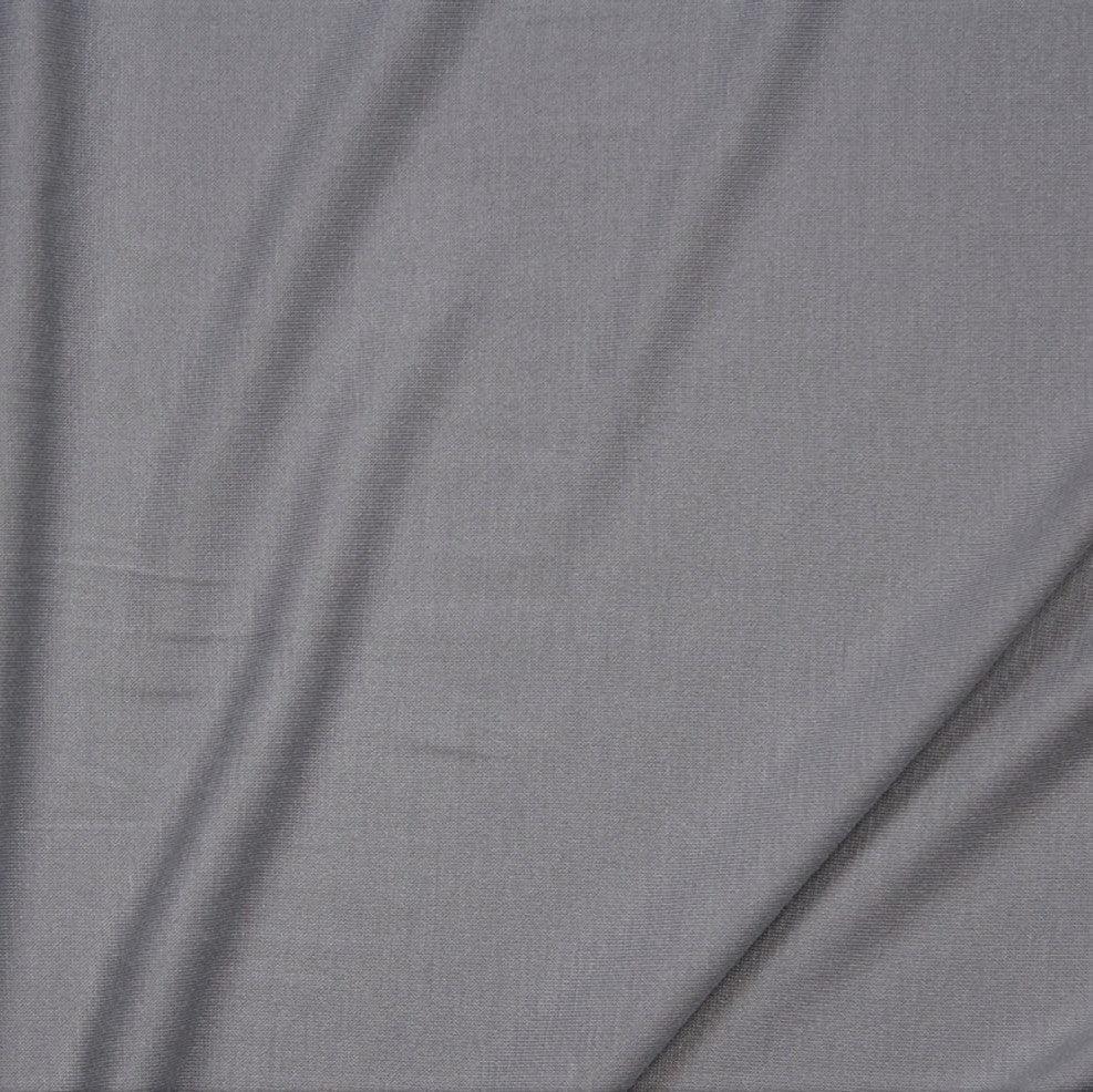 Close-up of draped grey natural fabric from Nature's Fabrics