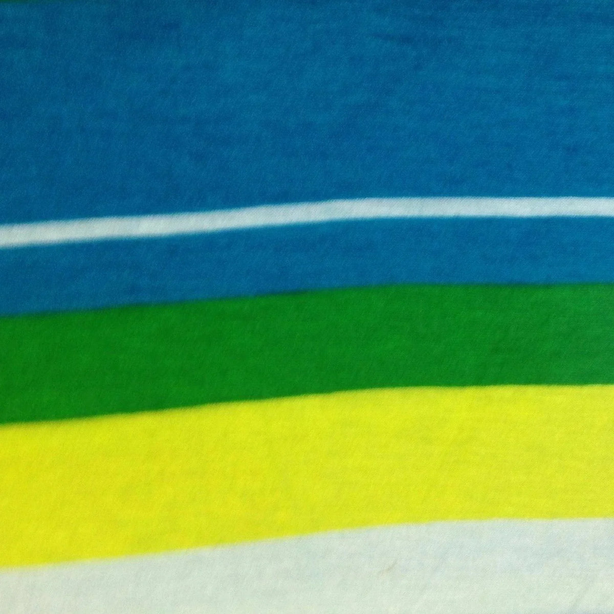 Nature's Fabrics blue, green, yellow, and white striped natural fabric.