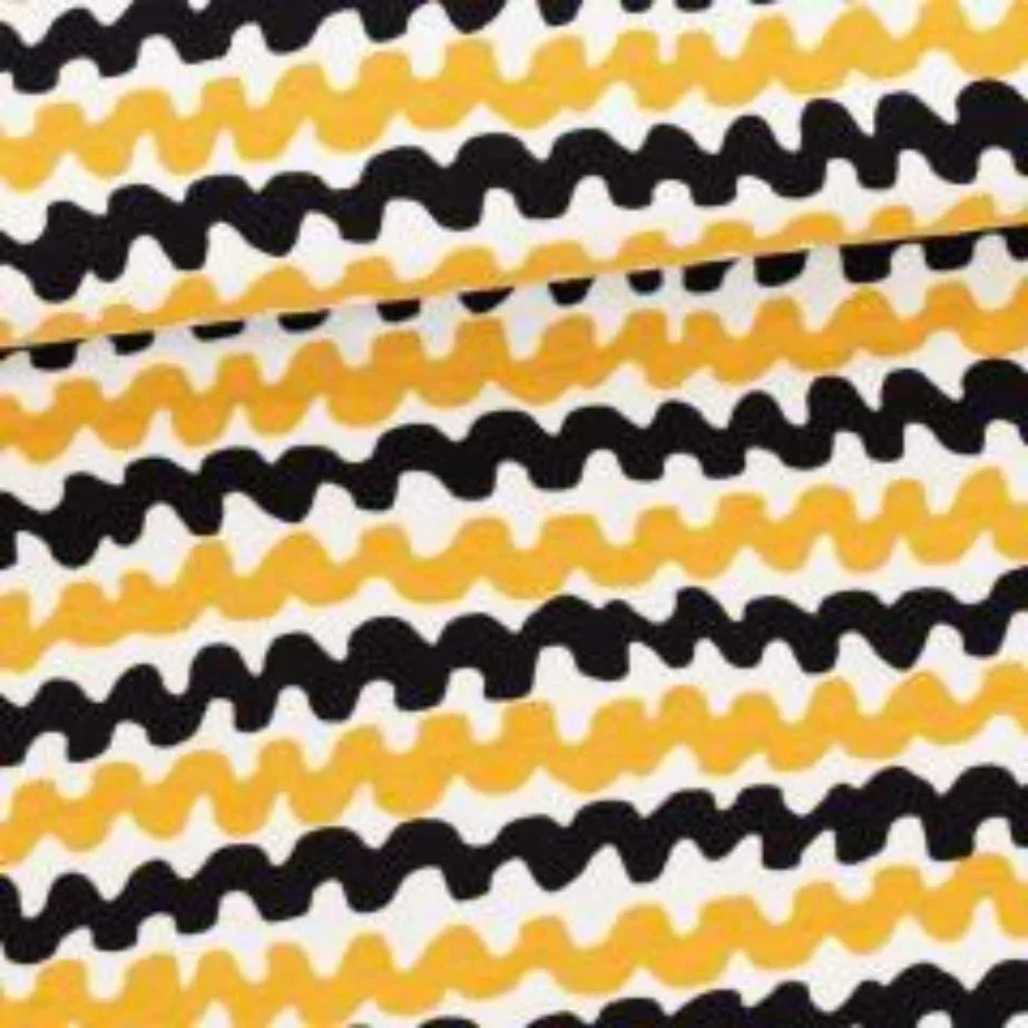 Nature's Fabrics yellow and black wavy stripe pattern fabric
