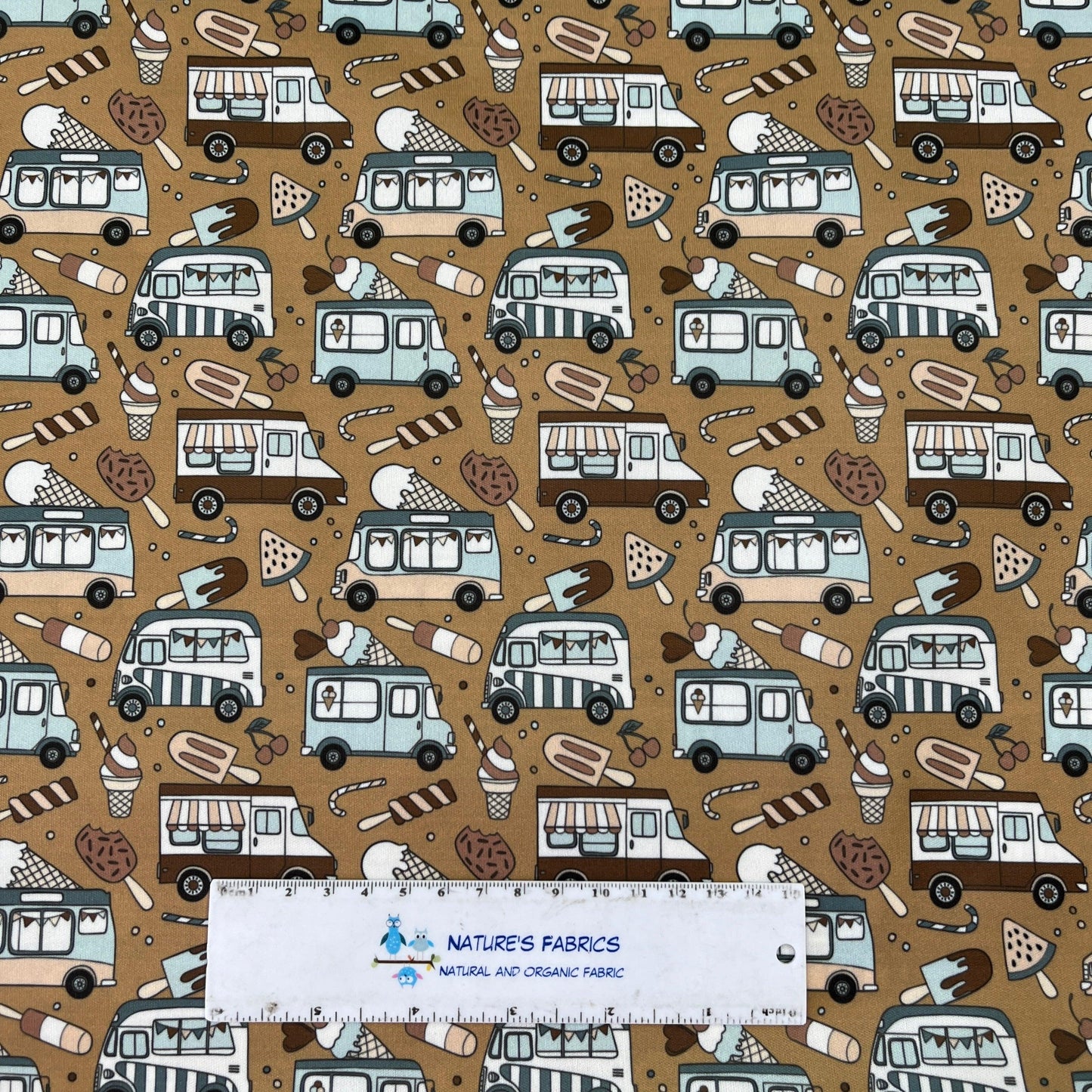Ice Cream Trucks on Brown 1 mil PUL Fabric - Made in the USA - Nature's Fabrics
