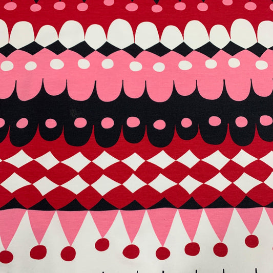 Nature's Fabrics red, pink, black, and white geometric patterned fabric