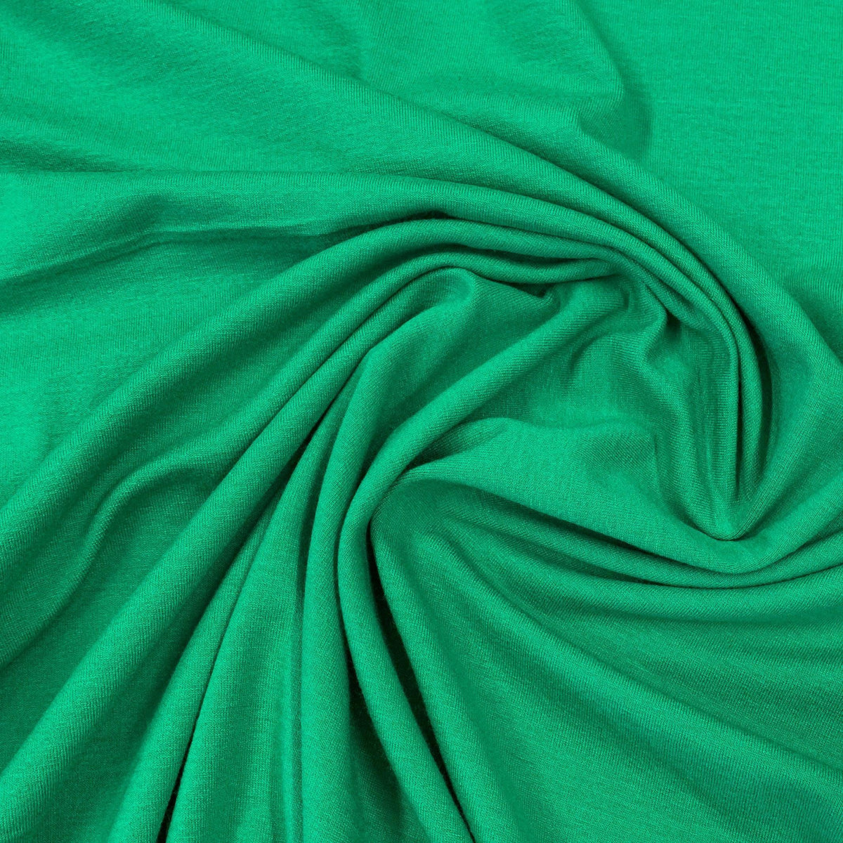 Nature's Fabrics green natural fabric with soft folds and ripples