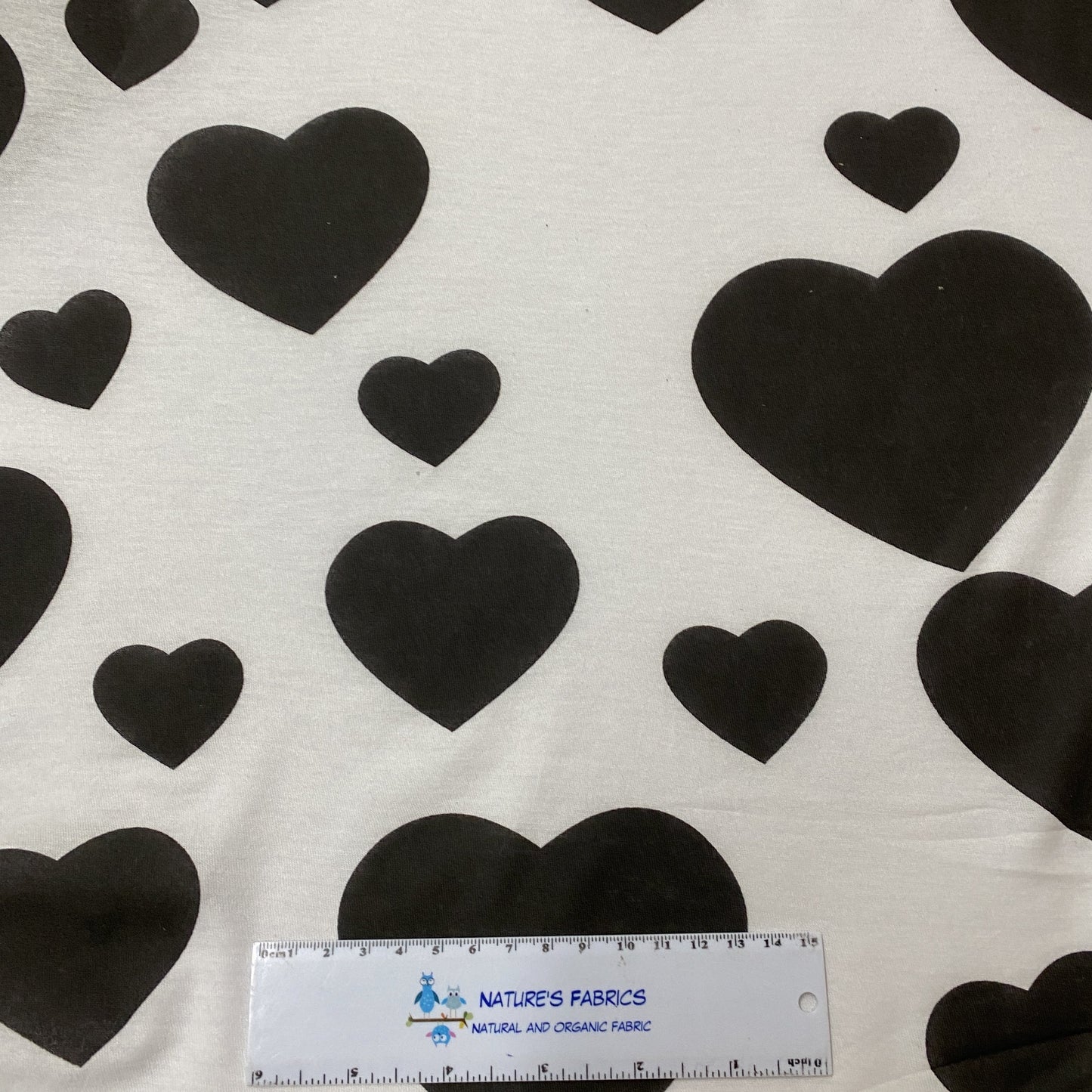 Large Black Hearts on White Cotton Jersey Fabric - Nature's Fabrics