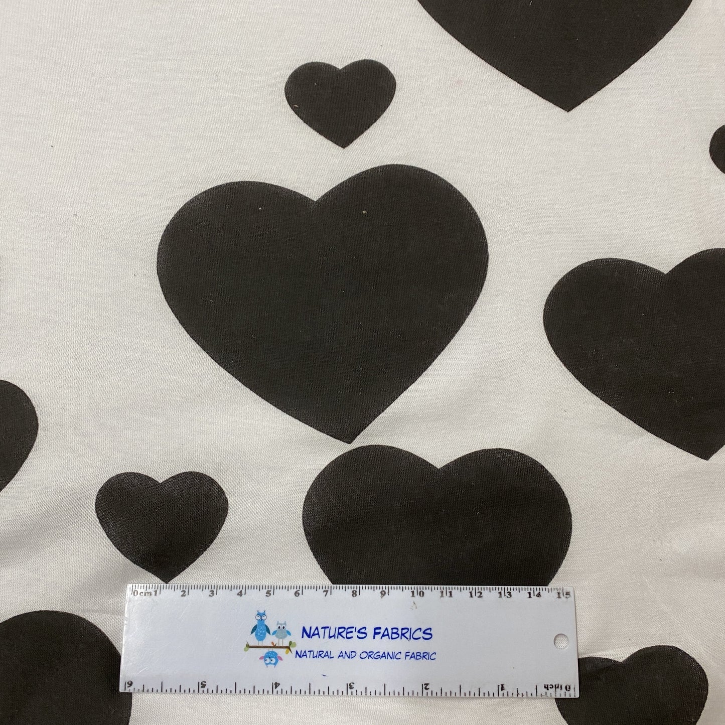 Large Black Hearts on White Cotton Jersey Fabric - Nature's Fabrics