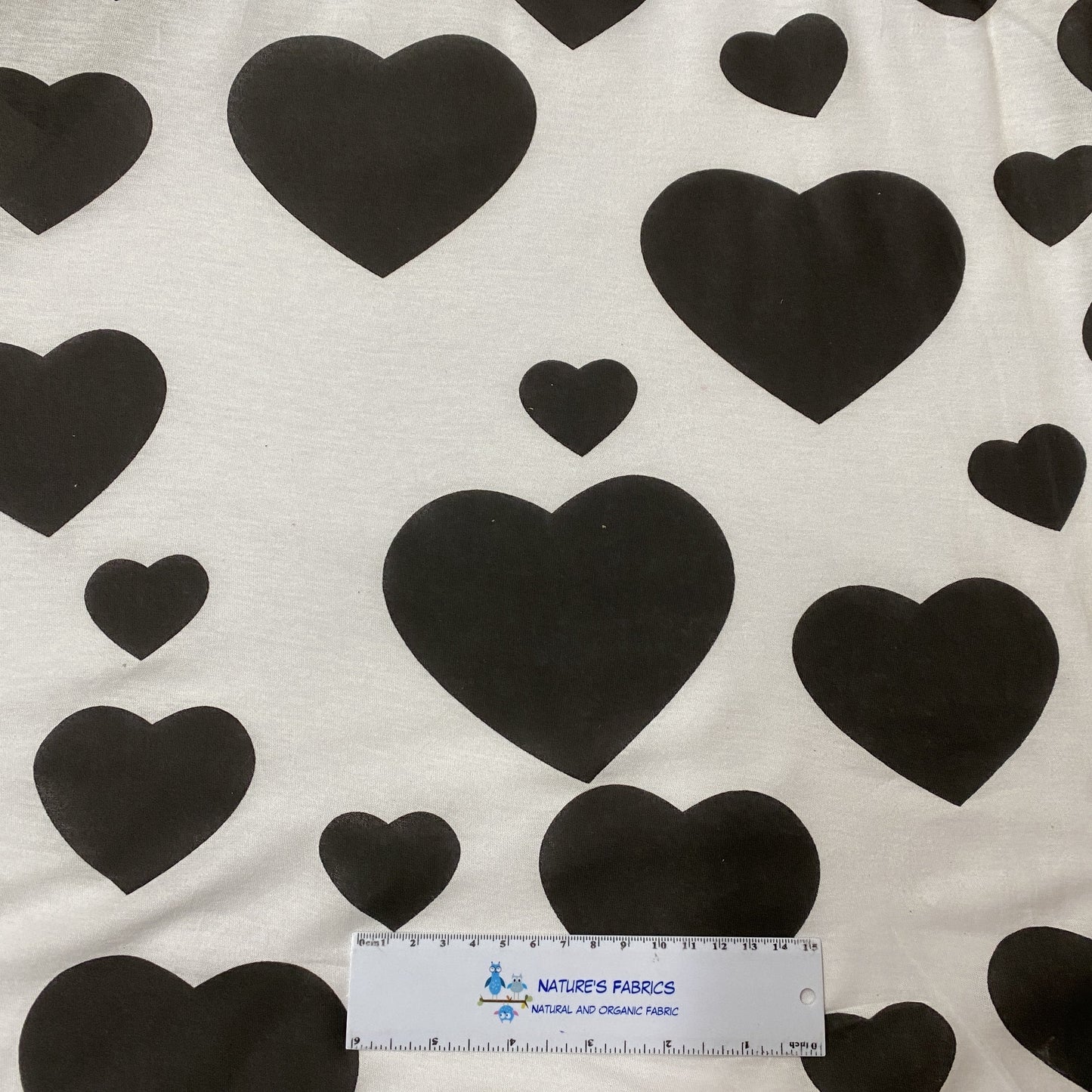 Large Black Hearts on White Cotton Jersey Fabric - Nature's Fabrics