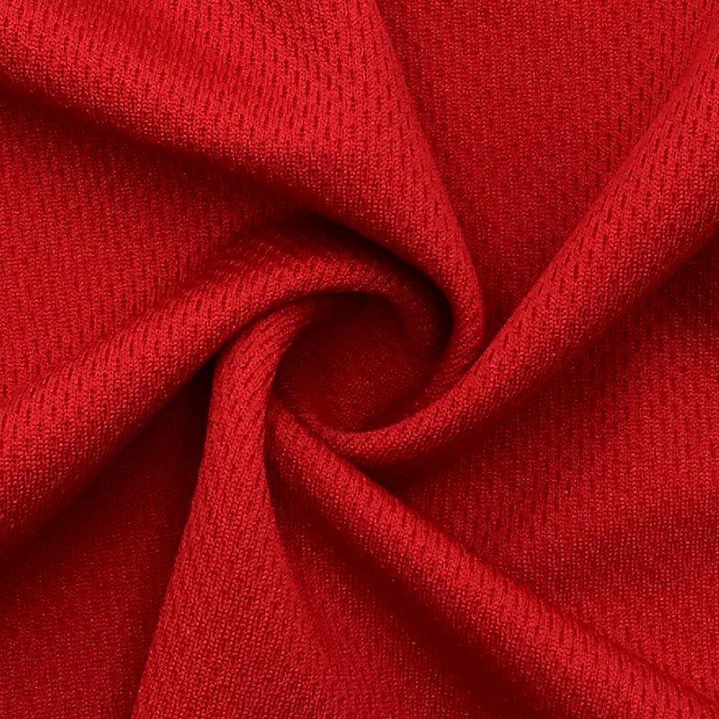 Close-up of draped red fabric texture from Nature's Fabrics.